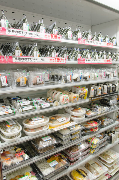 many food on  shelf display in convenience store