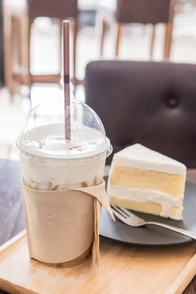 Coconut cake with iced coffee — Stock Photo, Image