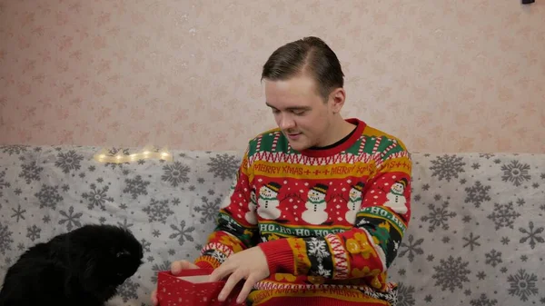 New Years Holidays Young Guy Opens Wraps Gift Champagne New — Stock Photo, Image