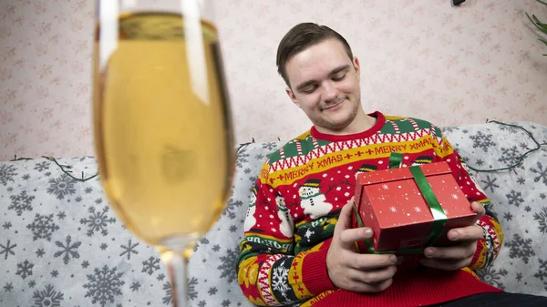 New Year Holidays Young Guy Opens Wraps Gift Champagne New — Stock Photo, Image