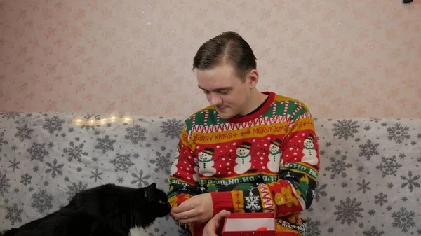 New Years Holidays Young Guy Opens Wraps Gift Champagne New — Stock Photo, Image