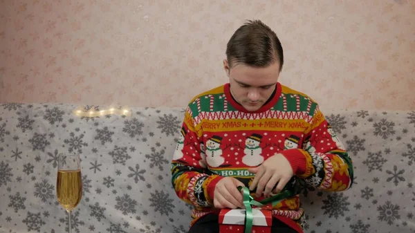 New Year Holidays Young Guy Opens Wraps Gift Champagne New — Stock Photo, Image