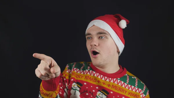 Young Handsome Guy Shows Emotion Points Finger Wearing Red New — Stock Photo, Image