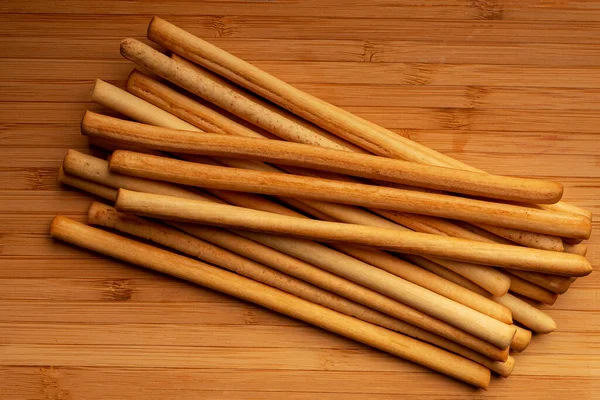 Gran Número Grissini Que Encuentran Una Tabla Madera Vista Superior —  Fotos de Stock