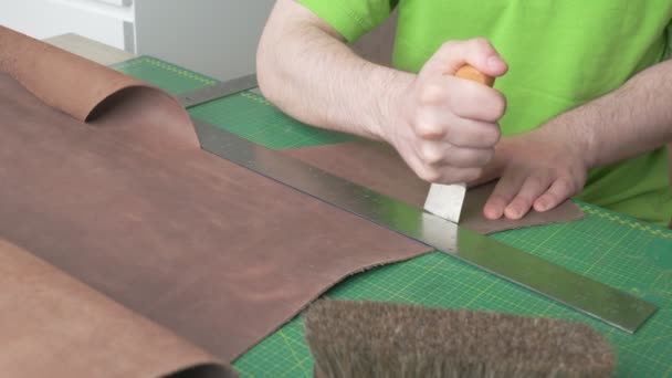 Young Leather Craftsman Works Home Craftsman Measures Ruler Cut Leather — Stock Video
