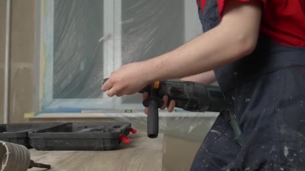 Builder Assembles Hammer Drill Work Wearing Construction Clothes Hard Hat — Stock Video