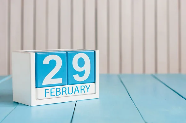 February 29th. Cube calendar for february 29 on wooden surface with empty space For text. Leap year, intercalary day — Stock Photo, Image