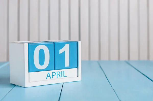 April 1st. Image of april 1 wooden color calendar on white background.  Spring day, empty space for text. All Fools Day — Stock Photo, Image