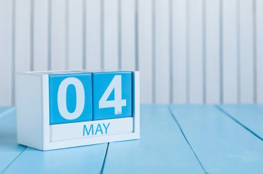 May 4th. Image of may 4 wooden color calendar on white background.  Spring day, empty space for text.  International or World Press Freedom Day