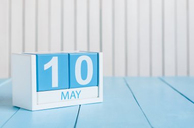 May 10th. Image of may 10 wooden color calendar on white background.  Spring day, empty space for text.  International or World Press Freedom Day
