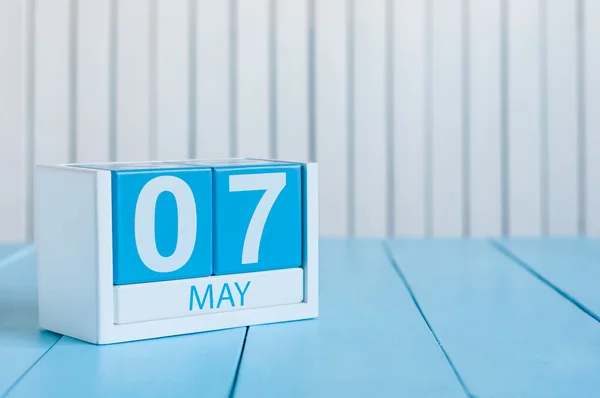 May 7th. Image of may 7 wooden color calendar on white background.  Spring day, empty space for text — Zdjęcie stockowe