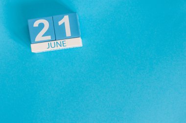 June 21st. Image of june 21 wooden color calendar on blue background. Summer day. Empty space for text. Go Skateboarding Day