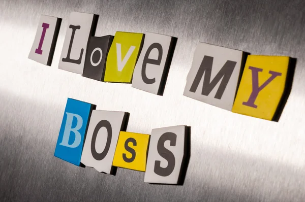 Love my boss written with color magazine letter clippings on metal background. Design for business relationship and work. Selective focus — Stock Photo, Image