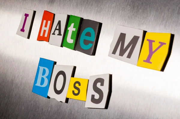 Hate My Boss written with color magazine letter clippings on metal background. Design for business relationship and work. Selective focus — Stock Photo, Image