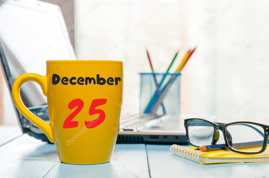 December 25th Eve Christmas. Day 25 of month, calendar on manager workplace background. New year concept. Empty space for text