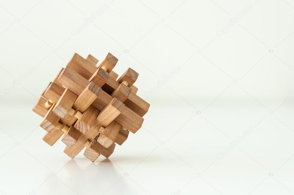 Wooden Brain Teaser on White Background