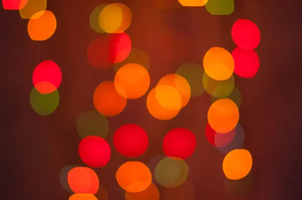 Laranja e vermelho desfocado luzes de fundo. abstrato Luz Bokeh — Fotografia de Stock