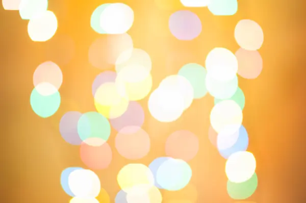 Gold glittering christmas lights. Blurred abstract background — Stock Photo, Image