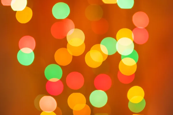 Luz Bokeh de la lámpara led sobre fondo naranja, efecto Color — Foto de Stock