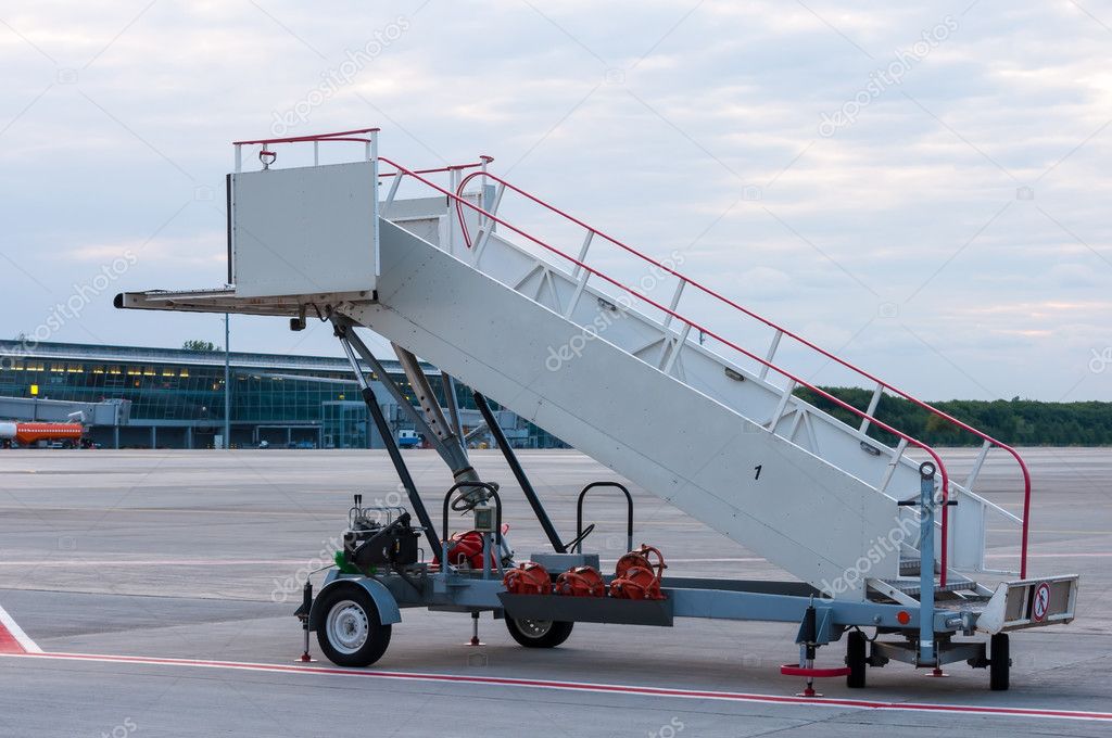 The image of a movable boarding ramp at the airport