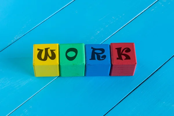 Word Work on childrens colourful cubes or blocks. Business background — Stock Photo, Image
