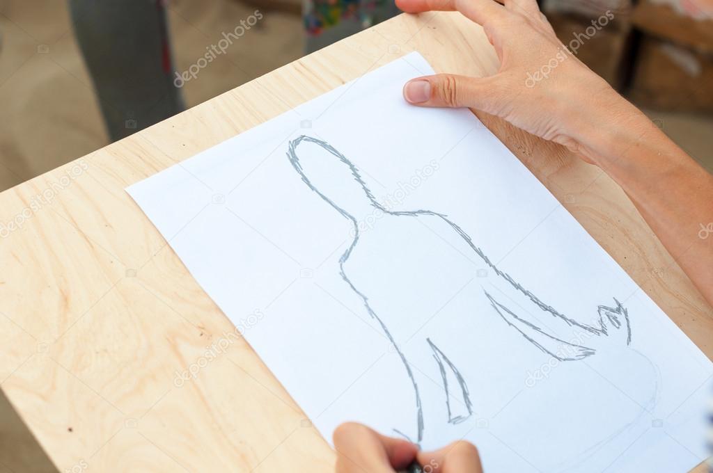hand drawing a man in the meditation position