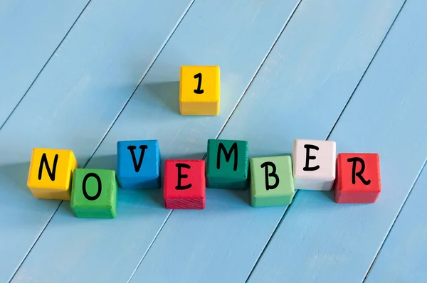 stock image Calendar for November 1 On childs toy cubes on wooden rural background.