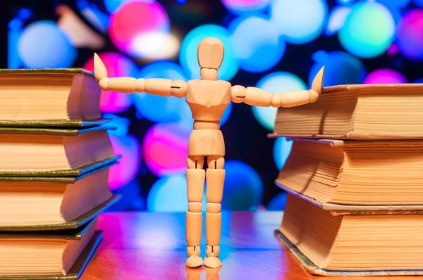 Education, knowledge and people concept - wooden student keep books — Stock fotografie