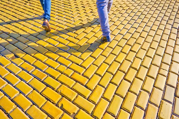 Man Food Wearing Brown Boot Staying Lively Yellow Cobblestone Pedestrian — Stock Photo, Image