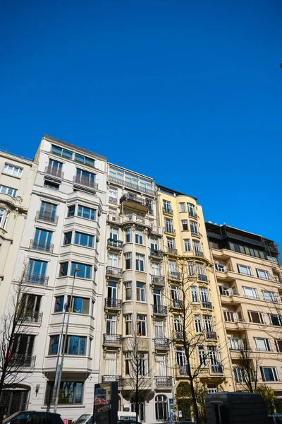 Old and historic apartments with ottoman styled. Turkey. Istanbul 04.03.2021 near istanbul bosphorus. Apartment facades with blue sky.