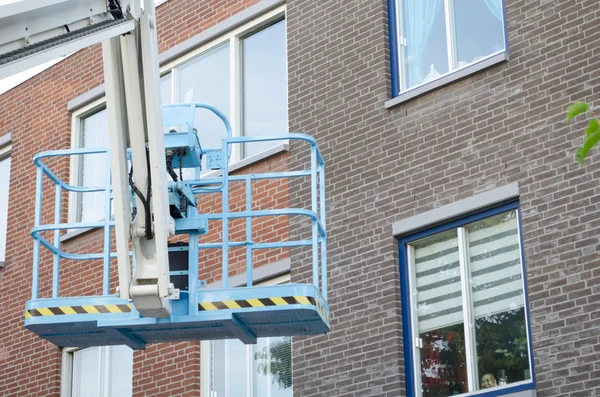 Stock machine with building in the background — Stock Photo, Image