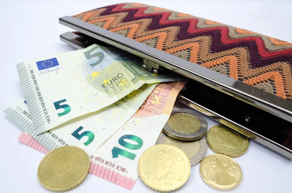 çanta üzerinde beyaz izole para ile