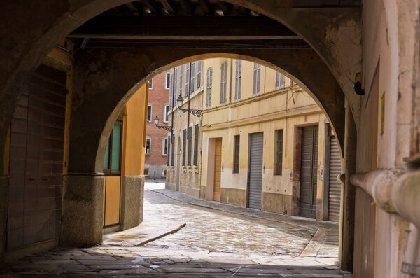 Narrow streets of historic downtown of Parma, Emilia-Romagna, Italy