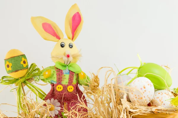 Easter bunny and decorated Easter eggs — Stock Photo, Image