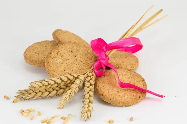 Integrerad cookies och veteplantan på vit baclground — Stockfoto