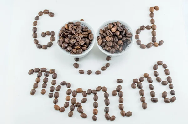 Two cups of coffee beans forming note — Stock Photo, Image