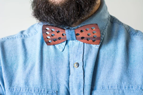 Bearded man with a wooden bow tie — Stock Photo, Image