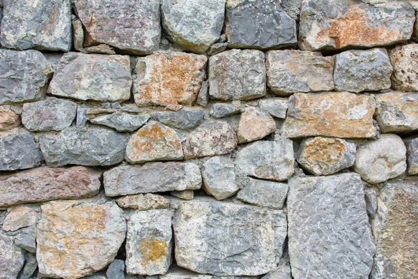 Old wall made of stones background Stock Photo