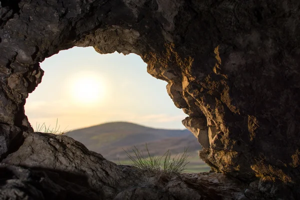 Looking thru a cave opening — Stock Photo, Image