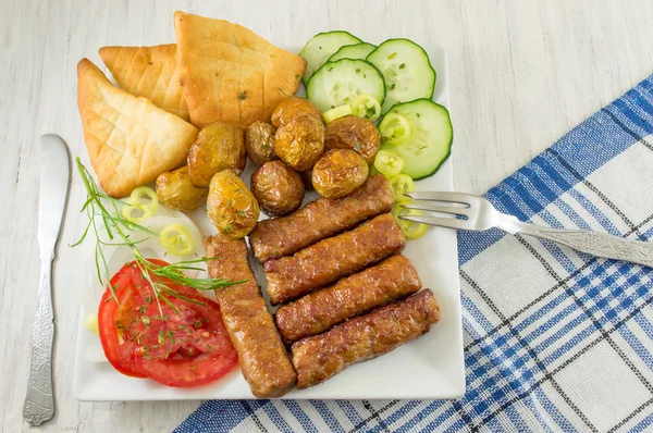 Barbecue on a plate with extras — Stock Photo, Image