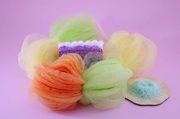 Colorful bath sponge with peeling soap and sea salt — Stock Photo, Image