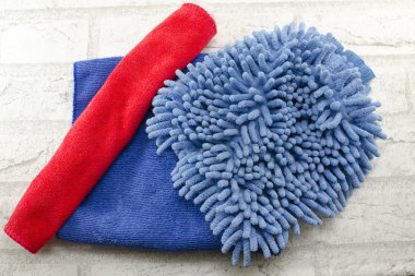 Blue and red dust wiping cloths clipart