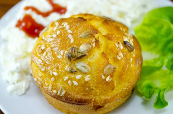 Corn bread with sesame on a plate — Stock Photo, Image