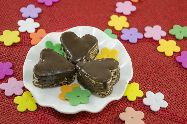 Heart shaped chocolate cookies on a plate — Stock Photo, Image