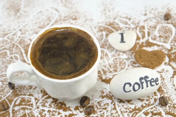 Cup of coffee with rocks saying "I love coffee" — Stock Photo, Image