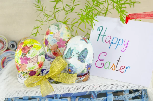 Three handpainted decoupage Easter eggs on stands — Stock Photo, Image