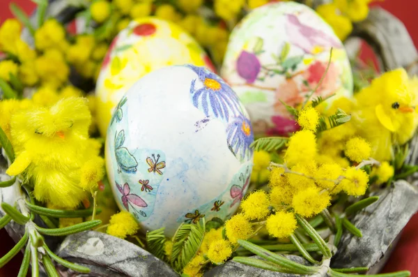 Basket full of handcolored Easter Eggs in decoupage closeup — Stock Photo, Image