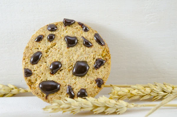 Čokoláda čip cookies a pšenice — Stock fotografie