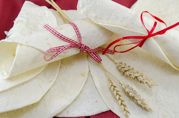 Fresh tortillas tied with a ribbon — Stock Photo, Image