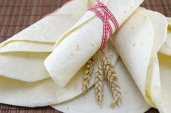 Fresh tortillas tied with a ribbon — Stock Photo, Image